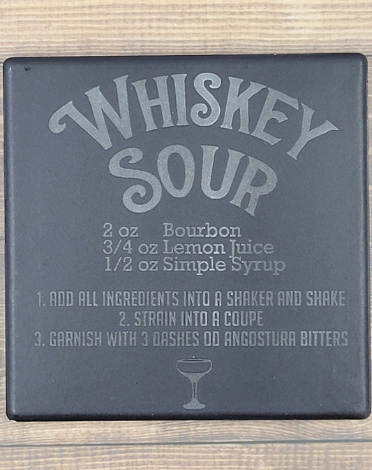 Whiskey Sour Recipe on a&nbsp; Natural Slate Coaster.  Full Recipe with instructions on making a classic drink forever engraved on this slate coaster.  These slate coasters will make a great addition to anyplace from your bar to your coffee table. These are actual stone slate measuring approximately 4" x 4". Each coaster will have 4 foam padded feet.