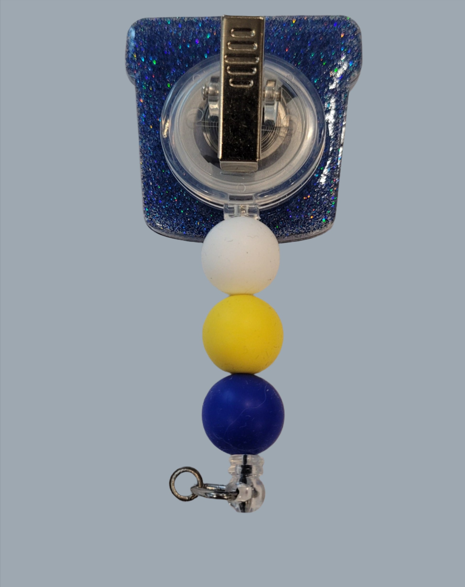 Part of our latest collection of Medical Badge Reels available now, we will need this filled for the Stool Sample Badge Reel. Featuring a stool and a light blue glitter base adorned with coordinating beads, this Badge Reel is sure to catch....well we will leave that alone.