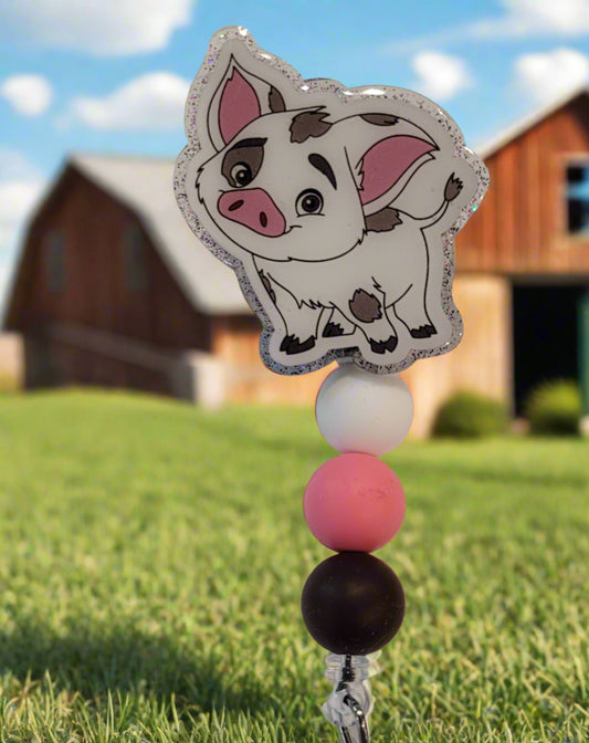Looking for a charming badge reel? Well, look no further because we've got our Cute Pig here! With a glittery gray back and 3 matching silicone beads, it's perfect for all the animal lovers out there.