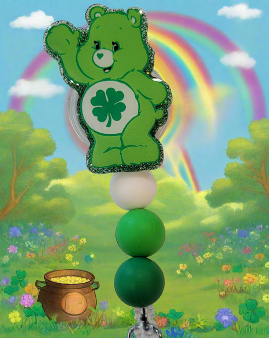 Looking for a charming badge reel? Well, look no further because we've got our Good Luck Bear here! With a glittery green back and 3 matching silicone beads, it's perfect for all the bear lovers out there. This is 1 of 5 variations.