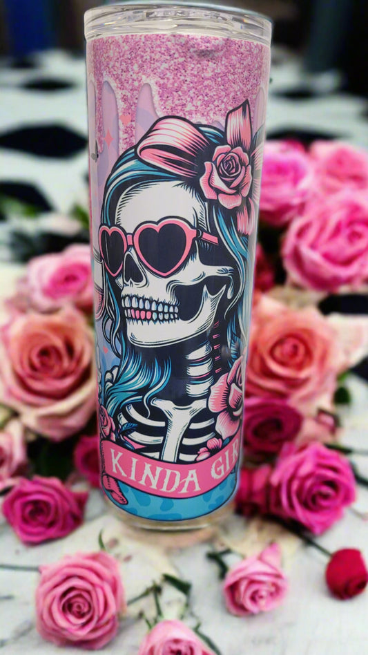 Just A Hawk Tuak Kinda Girl. Featuring a wine sipping skeleton gal surrounded by pink roses and a glitter drip. This 20 oz tumbler from Makerflo is made of a stainless steel double-wall construction and is vacuum insulated, with a clear sliding classic lid and a clear straw, and is BPA free. It is capable of retaining cold temperatures for 24+ hours or warm temperatures for up to 8 hours.