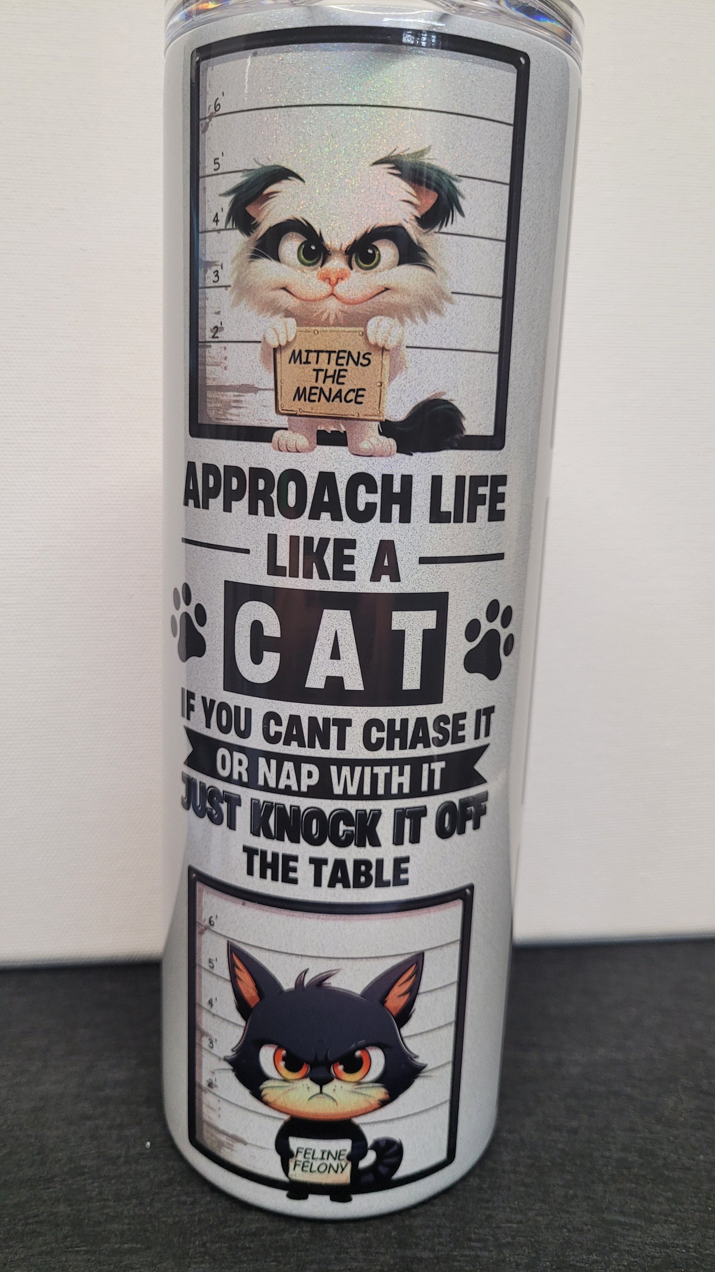 Handle Every Stressful Situation Like A Cat! If You Can't Chase It or Nap With It Just Knock It Off The Table. This tumbler really pops on our holographic 20 oz tumbler. Enjoy your favorite hot or cold beverage on the go and show off your style as you keep your drinks at the perfect temperature.