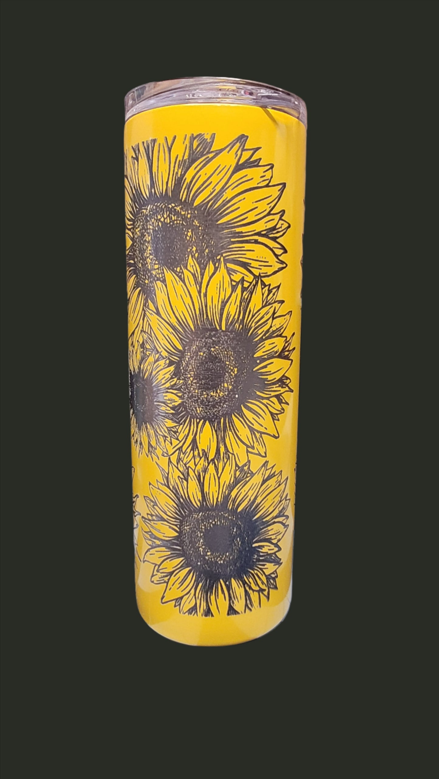 Here we have a full wrap engraved tumbler loaded with sunflowers. This Makerflo 20 Oz Stainless Steel Powder Coated Tumbler is precision laser engraved. Includes a silicone matching colored straw. Excellent insulating properties to keep your cold drinks cold or your hot ones hot.