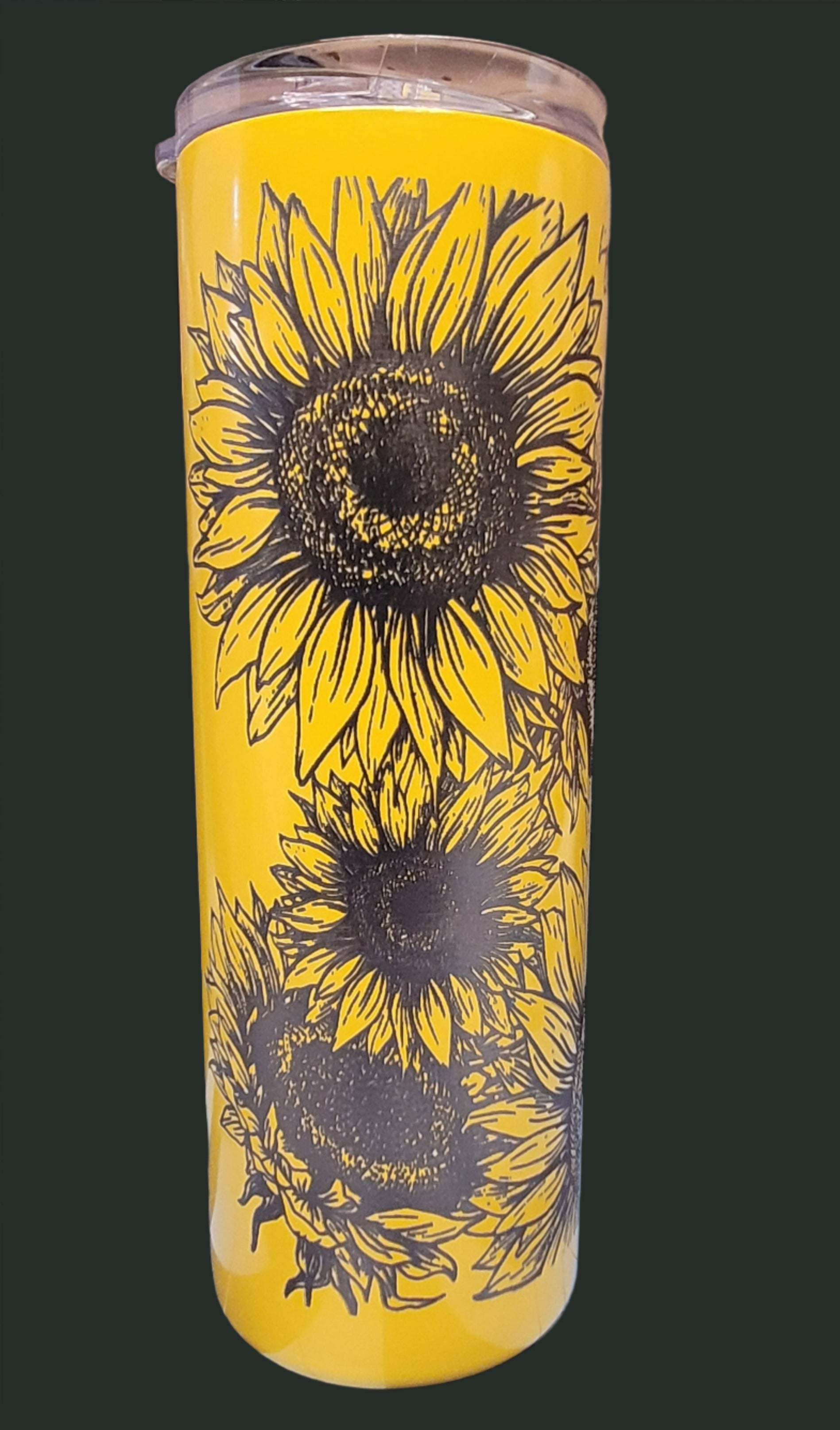 Here we have a full wrap engraved tumbler loaded with sunflowers. This Makerflo 20 Oz Stainless Steel Powder Coated Tumbler is precision laser engraved. Includes a silicone matching colored straw. Excellent insulating properties to keep your cold drinks cold or your hot ones hot.