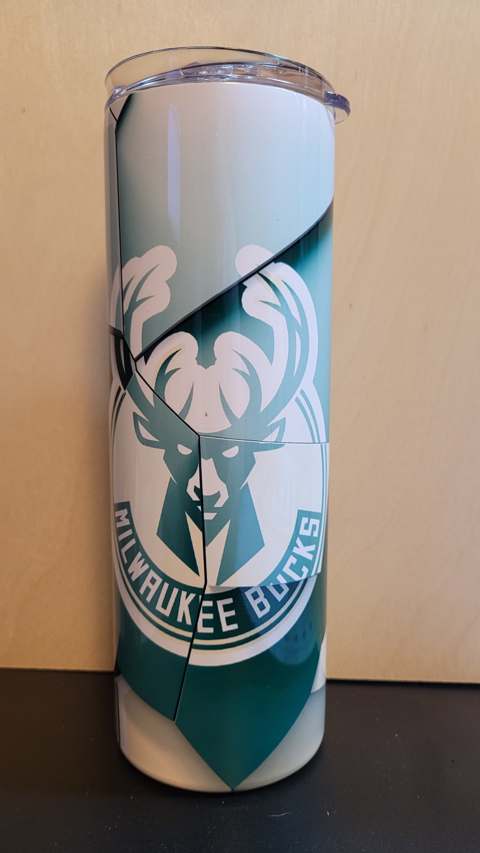 &nbsp;We present our new Sports Series to you with this Milwaukee Bucks Abstract Blocks tumbler. Bucks colors broken up and pieced back to together for a unique look