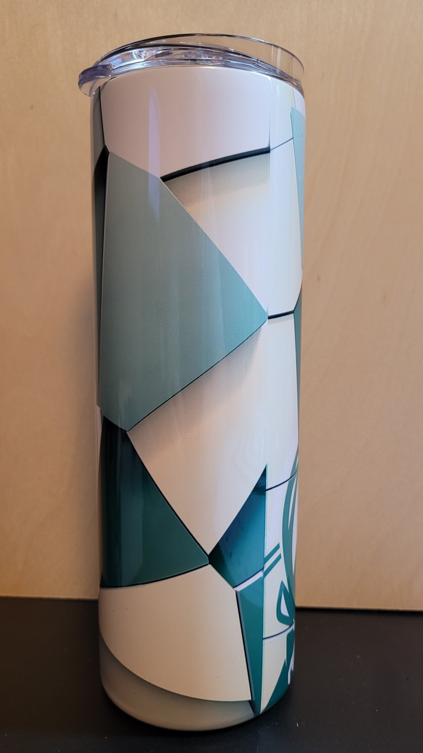 &nbsp;We present our new Sports Series to you with this Milwaukee Bucks Abstract Blocks tumbler. Bucks colors broken up and pieced back to together for a unique look