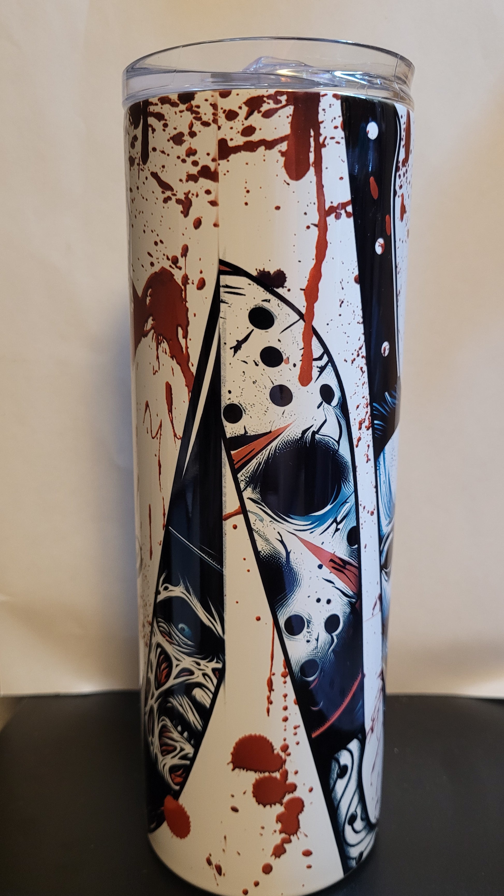 Move over Hot Girl Summer... It's Spooky Bitch Season. With the 4 famous horror boys mirrored on the blades of knives, it will make you want to fill this tumbler up with your favorite beverage, get some popcorn and fire watch your favorite horror flick. This Makerflo 20 oz tumbler is made of high-quality stainless steel construction and sweat-resistant design ensures your favorite drinks stay cool for longer.