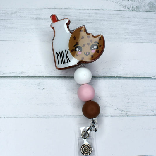 The classic combination of Milk & Cookies is featured prominently on this acrylic badge reel, finished with white, pink, and brown silicone bead