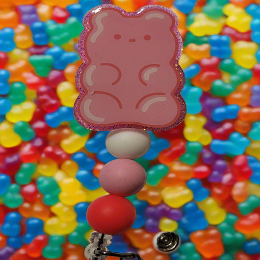 As a Gummy Bear in a Gummy World, these irresistible Badge Reels will have you craving for more! Pick from a range of vibrant colors and silicone accent beads for a truly tasty look!