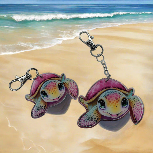 For the animal lovers we have this Pink Sea Turtle Bag Tag. Hand Crafted from acrylic resin, has a pink glitter back and adorable pink turtle on the front. We have in 2 sizes. Small is 1.25" x 2" and a large which is 2" x 2.5".