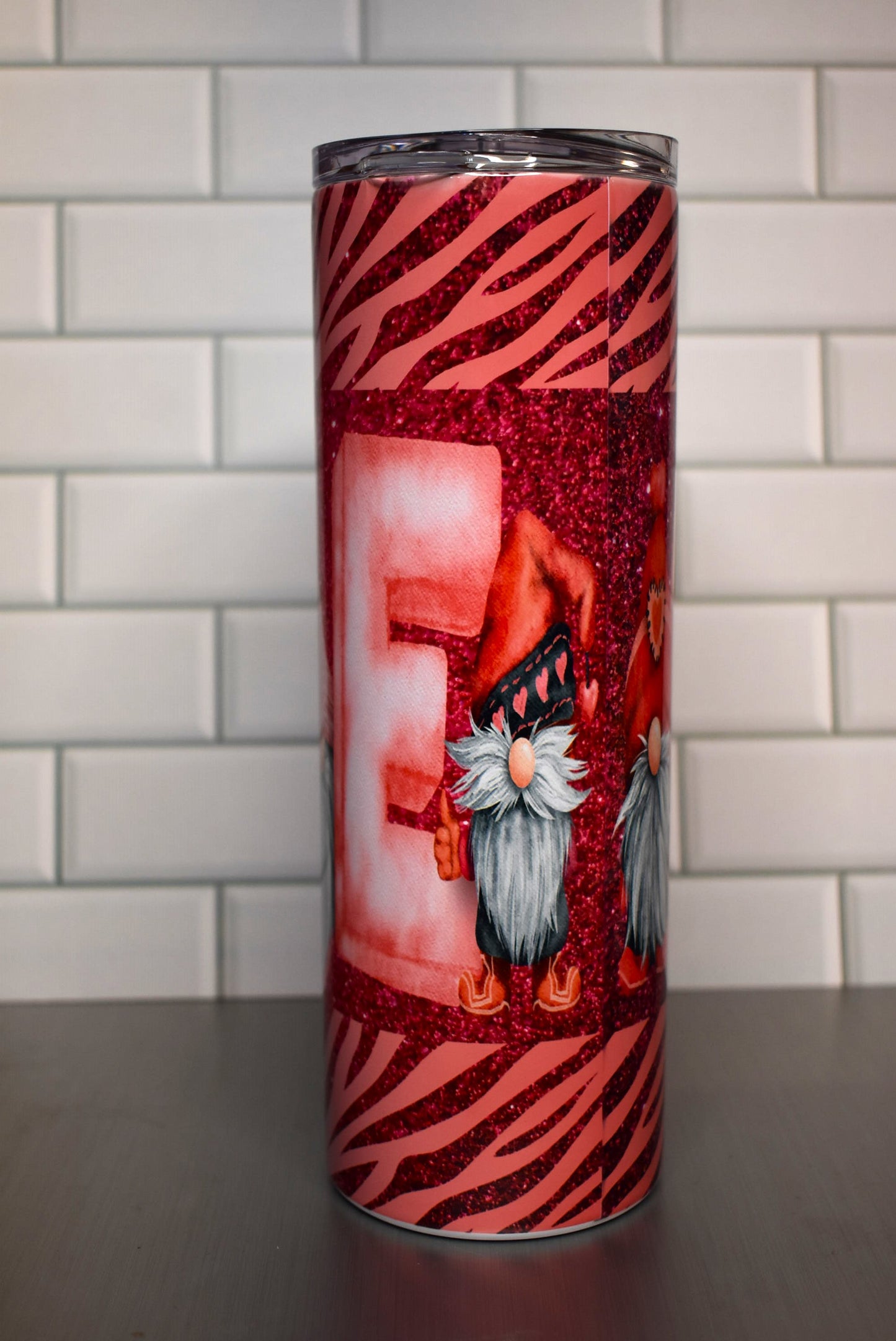 Love is in the air and has pretty glitter as well. This Valentines Gnome Love Tumbler is a eye catcher and heart stealer.