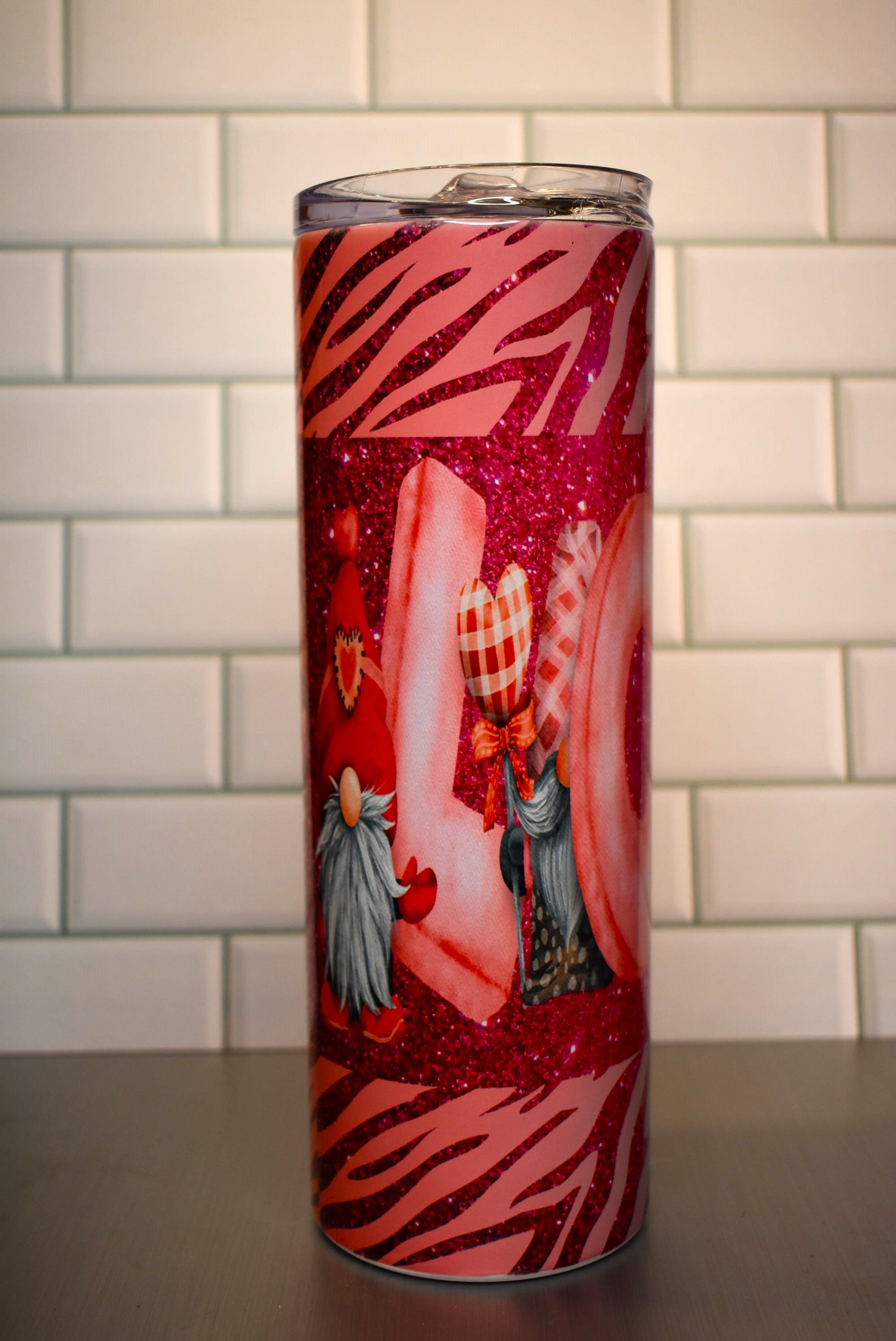 Love is in the air and has pretty glitter as well. This Valentines Gnome Love Tumbler is a eye catcher and heart stealer.