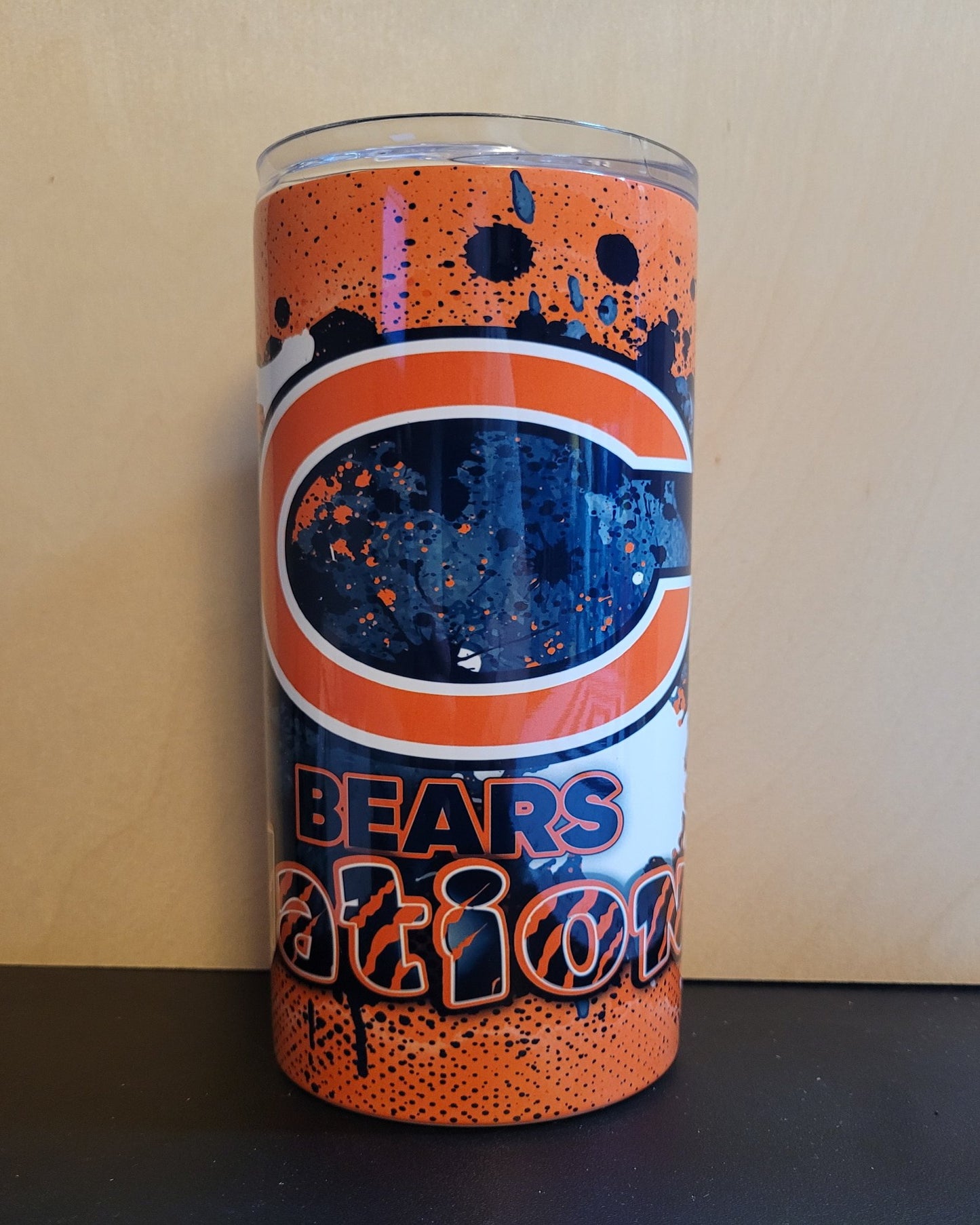 We present our new Sports Series to you with this Bears Paint Splash tumbler. Navy blue &amp; orange colors in a paint splatter format for a unique look.