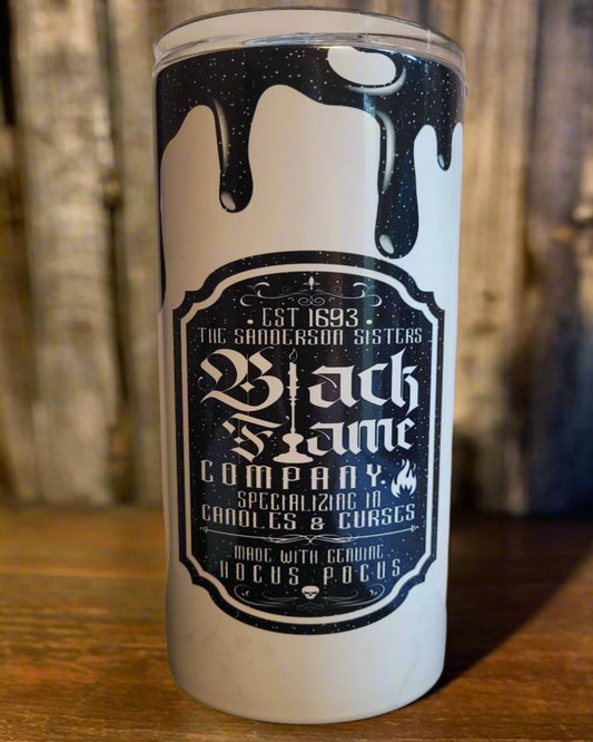 The Black Flame Company established in 1693 and specializing in Candles & Curses. Say What! Features an all black image with the classic drip look. Made with Genuine Hocus Pocus, this tumbler is a sure Halloween favorite. This 20 oz tumbler is made of a stainless steel double-wall and is vacuum insulated, with a clear sliding classic lid and a clear straw, and is BPA free. It is capable of retaining cold temperatures for 24+ hours or warm temperatures for up to 8 hours.