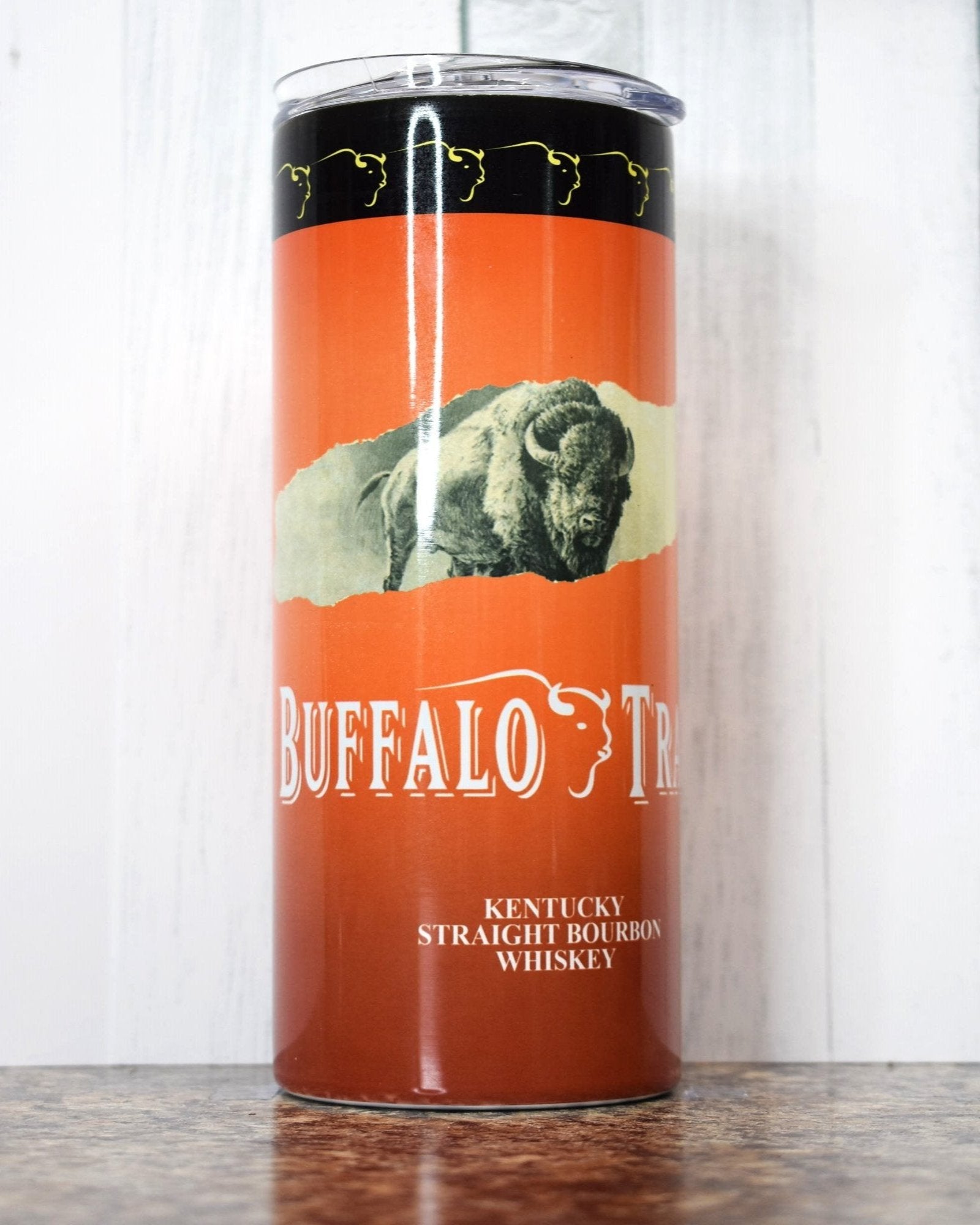 This 20 oz stainless steel tumbler comes straight from Kentucky...Kentucky stills that is. Buffalo Trace... a quality Kentucky Straight Bourbon Whiskey is depicted beautifully here with the classic Buffalos in yellow and full image. 