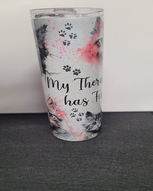 My Therapist Has Fur. This gorgeous tumbler has that phrase with various cute cat pics that will melt your heart and and stress you have. Enjoy your favorite hot or cold beverage on the go and show off your style as you keep your drinks at the perfect temperature.