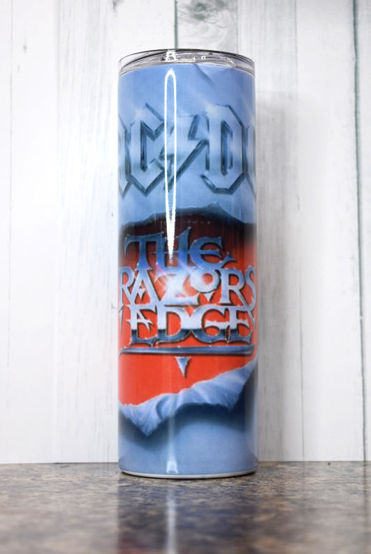 Here is another one from our Music Collection. This 20 oz Stainless Tumbler has the great ACDC album cover of The Razors Edge. Keep your drinks hot or cold all day thanks to its premium Makerflo Stainless Steel construction and a must-have for any fan.