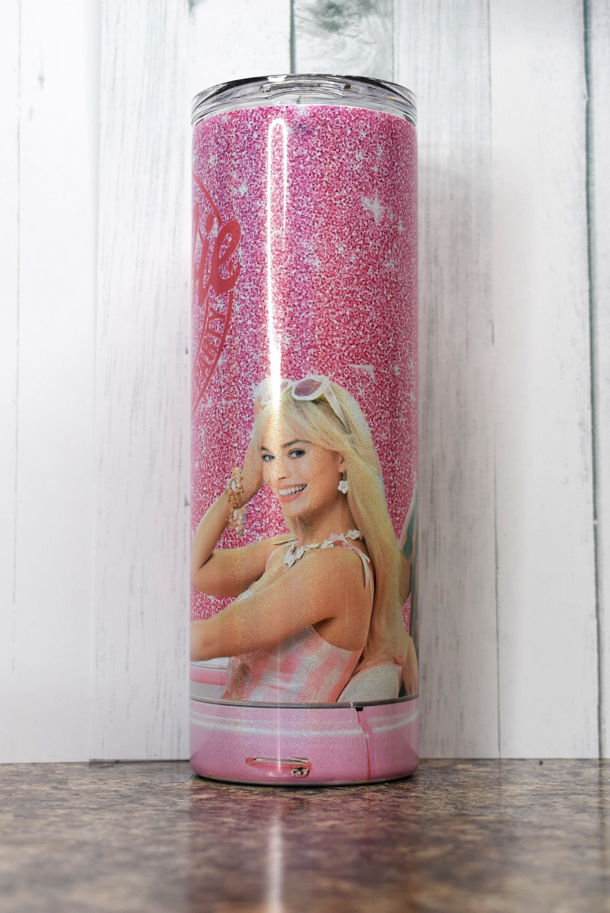 This 20oz Stainless Steel tumbler is all about Barbie. Let's Go Party with Barbie & Ken as they ride in the Barbie Mobile.