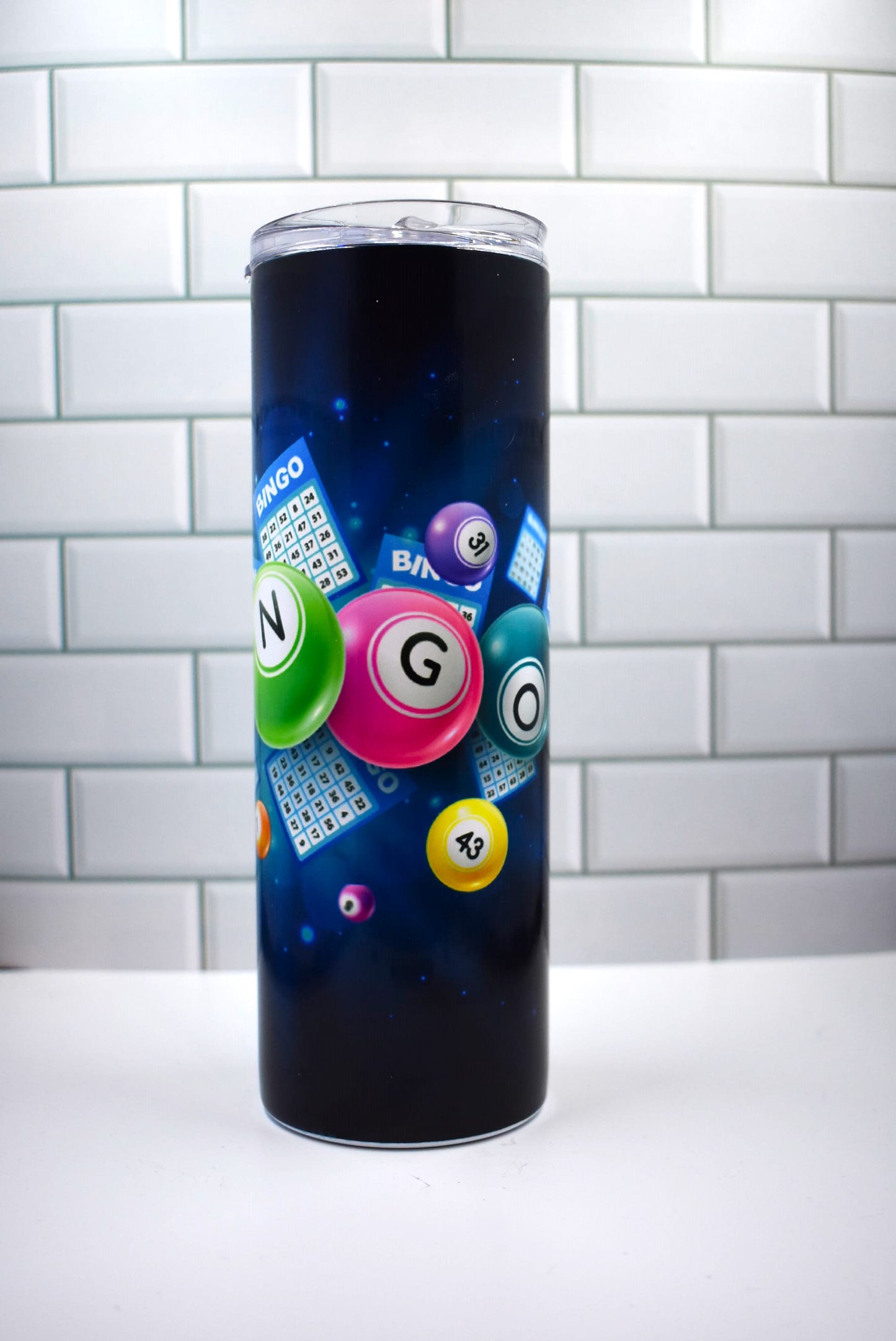 Boasting a 20 oz capacity and made from stainless steel and vacuumed insulated material, this Makerflo tumbler features the classic BINGO! image along with the iconic numbered ping pong balls. 