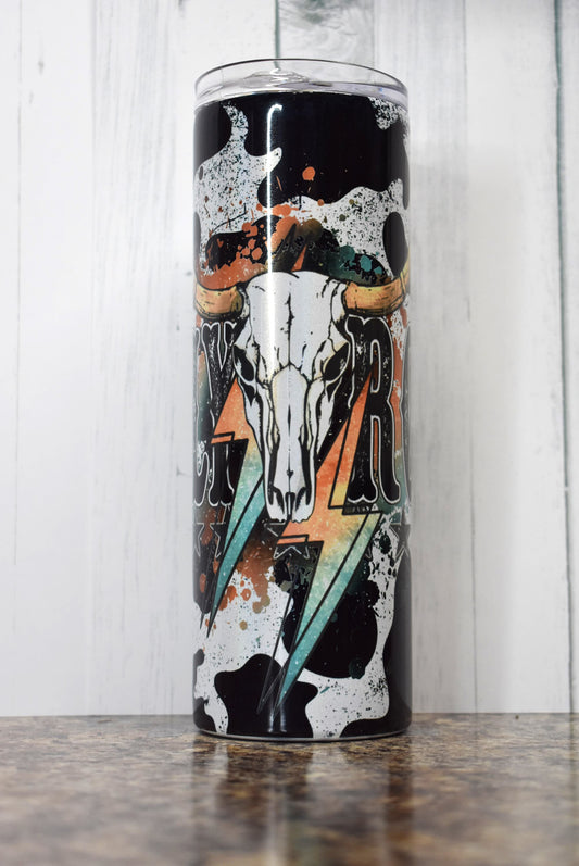 This 20 oz stainless steel Makerflo tumbler features artist Jelly Roll over a cowhide background and steer skull. 