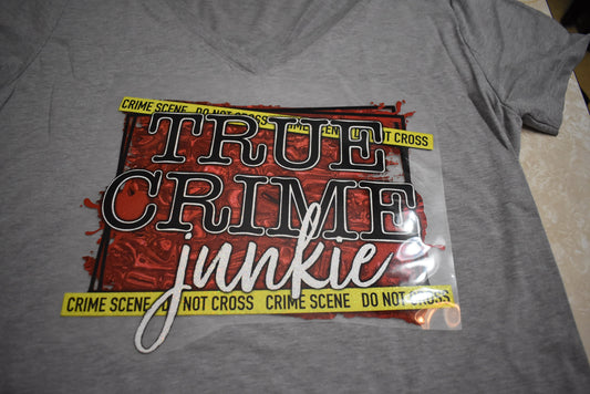 Binging some True Crime TV shows? Grab yourself this Screen Print Transfer shirt with True Crime Junkie image, some popcorn and a cold beverage.  All shirts are Unisex adult sized.   5.3 oz. 100% preshrunk cotton.  See chart for sizing. Offering in Grey Only for color.
