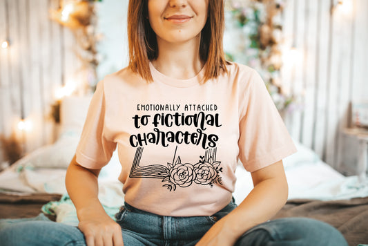 Our Emotionally Attached To Fictional Characters T-shirt is designed with a black screen print transfer for a stylish, professional look. Crafted of 5.3 oz. preshrunk 100% cotton, this comfortable shirt is sure to be a favorite.