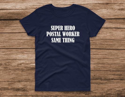 Our Unisex adult sized T-shirt features a Screen Print Transfer in white lettering boasting the phrase "Super Hero Postal Worker Same Thing." 5.3 oz. 100% preshrunk cotton.